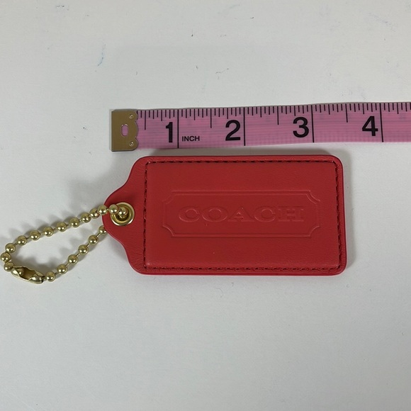 Coach Accessories - COACH Authentic Large Tag in Coral Color